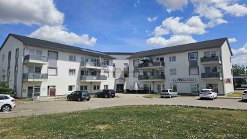 6.6% yield | 1,322 €/m²: Residential and commercial building in mint condition - Hausfront (24693)